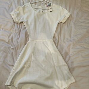 Fun, playful, white backless,  a-line t-shirt dress